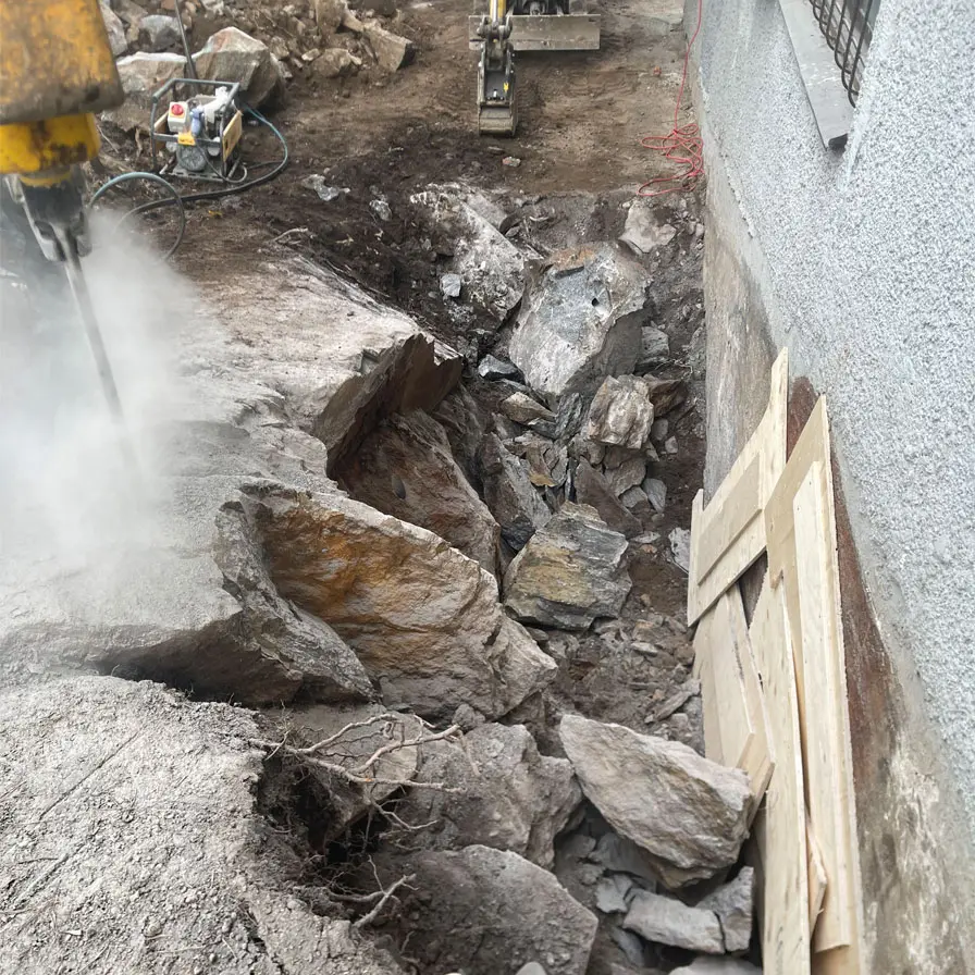 Borttagning berg vid husgrund