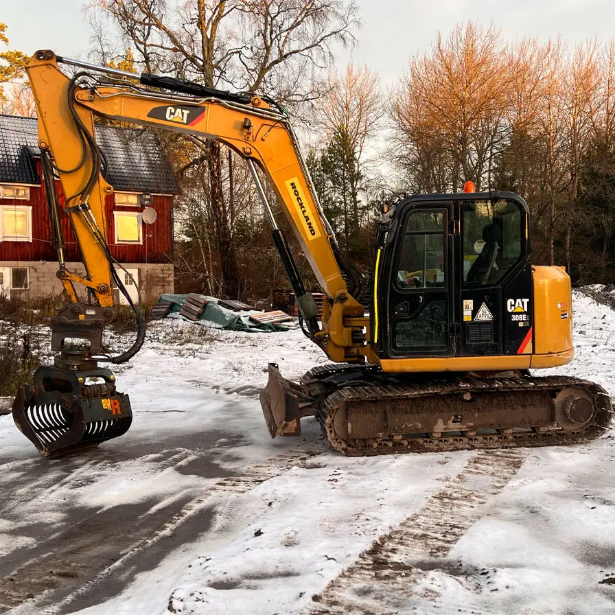 Grävmaskin CAT 308 med rivningsgrip
